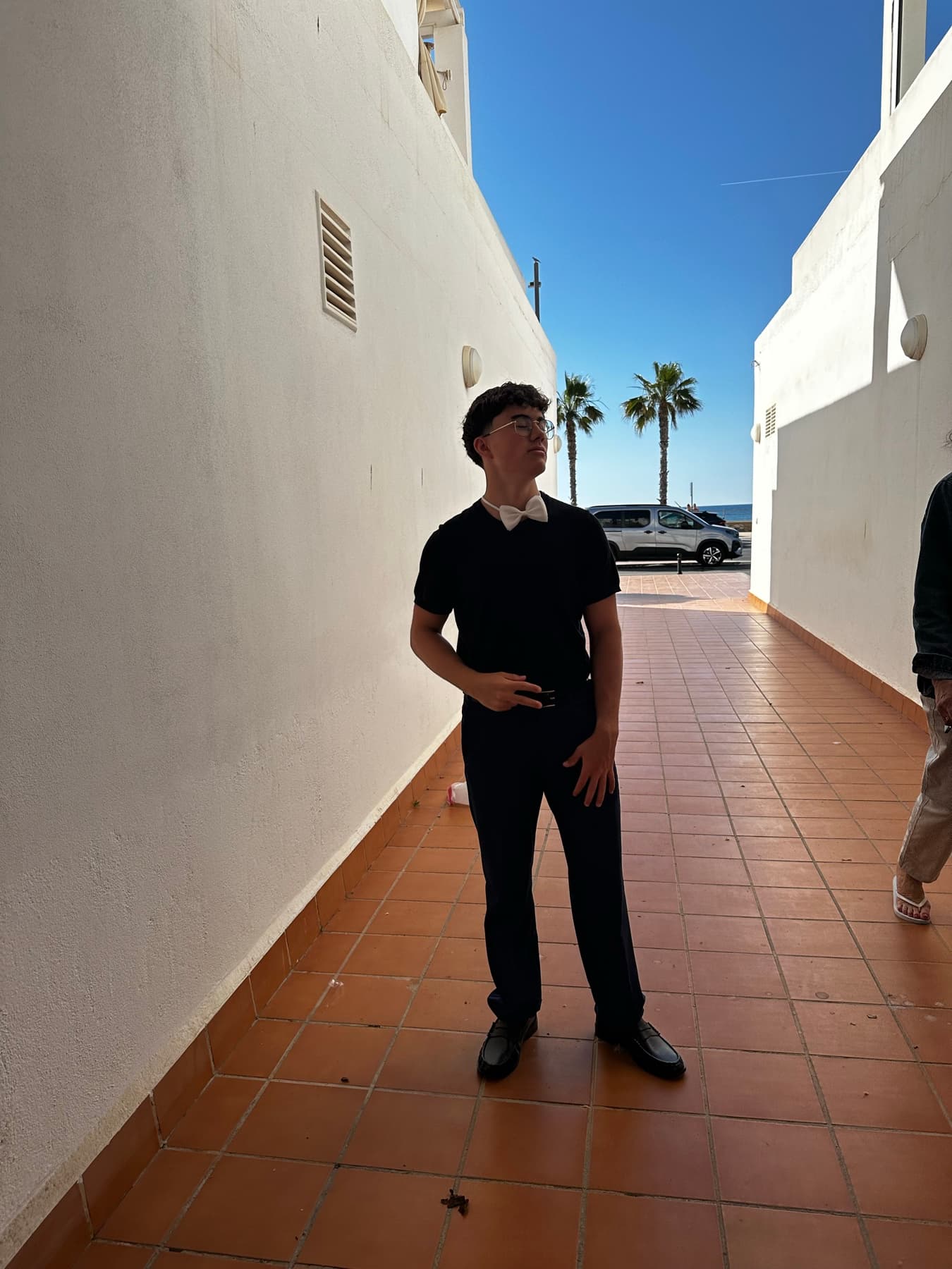 Aimar, founder of TuffStudy, standing outside by the sea.
